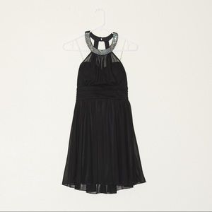 Nwt black halter dress rhinestones neck and ruffles